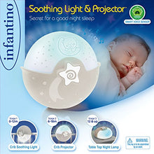 Load image into Gallery viewer, Infantino Soothing Light and Projector - Clip-on Crib Night Light with Grow-With-Me Design, Starry Night Projector and Tabletop Light with Built-in Melodies and Sound Sensors