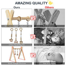 Load image into Gallery viewer, COSTWAY Baby Wooden Play Gym, Foldable Infants Gym Frame with Hanging Bar, 3 Teething Toys, Mobile Baby Exercise Activity Set for Newborn (Natural)