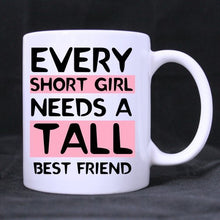 Load image into Gallery viewer, 11 Ounce- Novelty Funny Humor Every Tall Girl Needs A Short Best Friend White Ceramic Coffee Mug Cup, Tall Girl Mug, Short People Mug, Best Friend Mug - Great Gift Item for Anyone/Christmas/Birthday