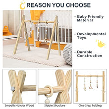 Load image into Gallery viewer, COSTWAY Baby Wooden Play Gym, Foldable Infants Gym Frame with Hanging Bar, 3 Teething Toys, Mobile Baby Exercise Activity Set for Newborn (Natural)