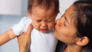 How to calm fussy baby during a change?